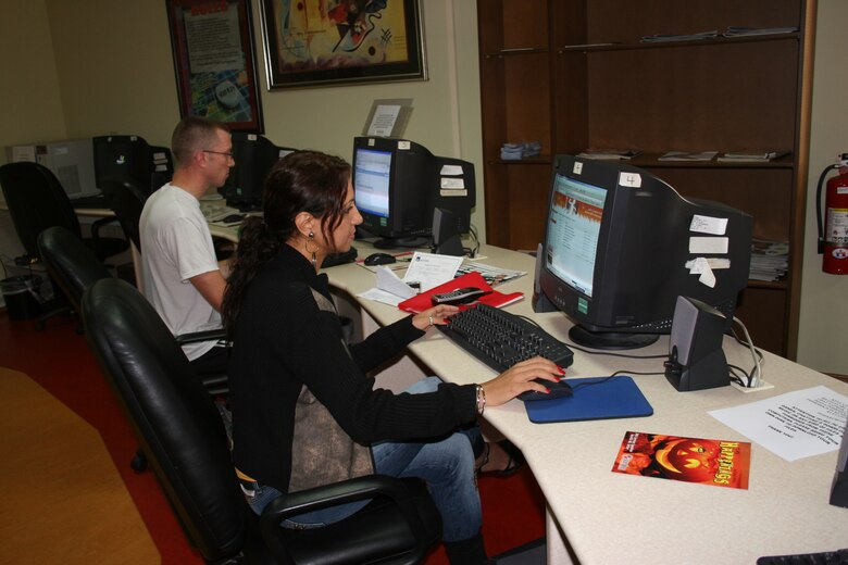 Two members of the Incirlik community take advantage of the Cyber Cafe inside of the community center Oct. 26. (U.S. Air Force photo by Staff Sgt. Oshawn Jefferson)