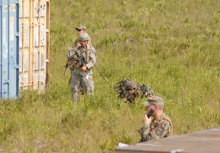 Members of the 19th Air Support Operations Squadron, Fort Campbell, Ky., communicate positions of hostiles during Atlantic Strike IV. (U.S. Air Force photo/Tech. Sgt. Keri S. Whitehead)