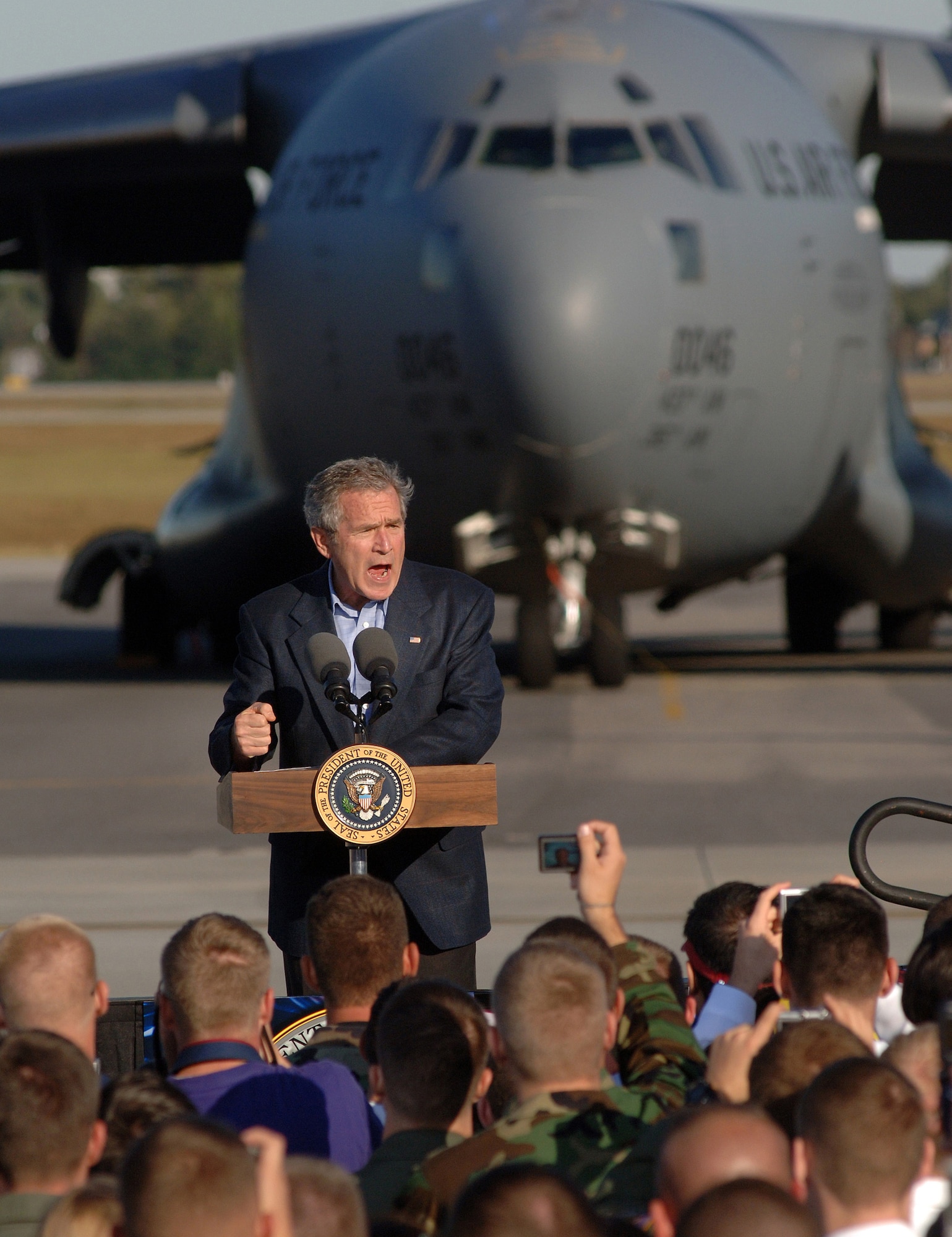 President George W. Bush speaks to airmen and their relatives at Charleston Air Force Base, S.C., Oct. 28. More than four thousand servicemembers and families attended the presidential rally were he spoke on the war on terrorism. (U.S. Air Force photo/Tech. Sgt. Larry A. Simmons) 