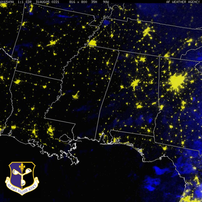 A Defense Meteorological Satellite nighttime image of the wide-spread power outages across the Gulf Coast of the United States after Hurricane Katrina ravaged the area. The DMSP F-15 satellite image from 9:21 p.m. (CST) Aug. 30, is a 1.5nm Resolution, Visible/Infrared composite with the Infrared portion in blue showing clouds and the Visible portion in yellow showing city lights and fires. Image courtesy of the Air Force Weather Agency. 