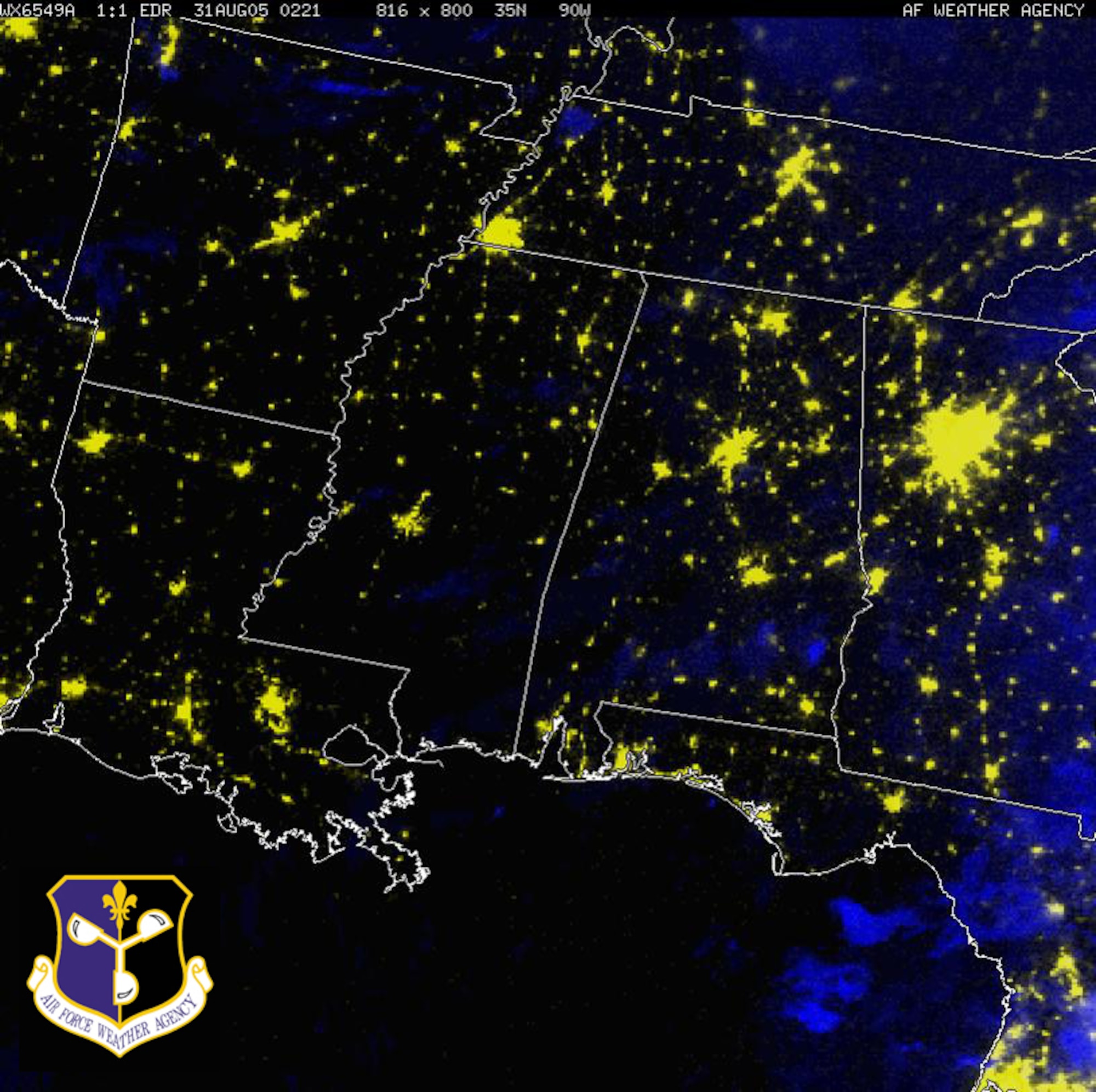 A Defense Meteorological Satellite nighttime image of the wide-spread power outages across the Gulf Coast of the United States after Hurricane Katrina ravaged the area. The DMSP F-15 satellite image from 9:21 p.m. (CST) Aug. 30, is a 1.5nm Resolution, Visible/Infrared composite with the Infrared portion in blue showing clouds and the Visible portion in yellow showing city lights and fires. Image courtesy of the Air Force Weather Agency. 