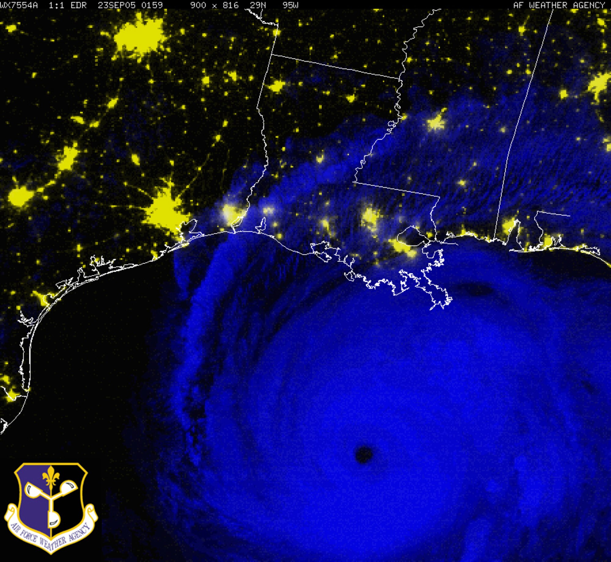 A Defense Meteorological Satellite Program nighttime image of Hurricane Rita churning in the Gulf of Mexico Sep. 22, 2005. The DMSP F-16 satellite image from 8:59 p.m. (CDT) Sep. 22, is a multispectral image that uses both infrared and visual satellite imagery to produce a color composite that reveals clouds and lights. The infrared portion is in blue, showing clouds, and the visible portion is in yellow, showing city lights. Image courtesy of the Air Force Weather Agency. 
