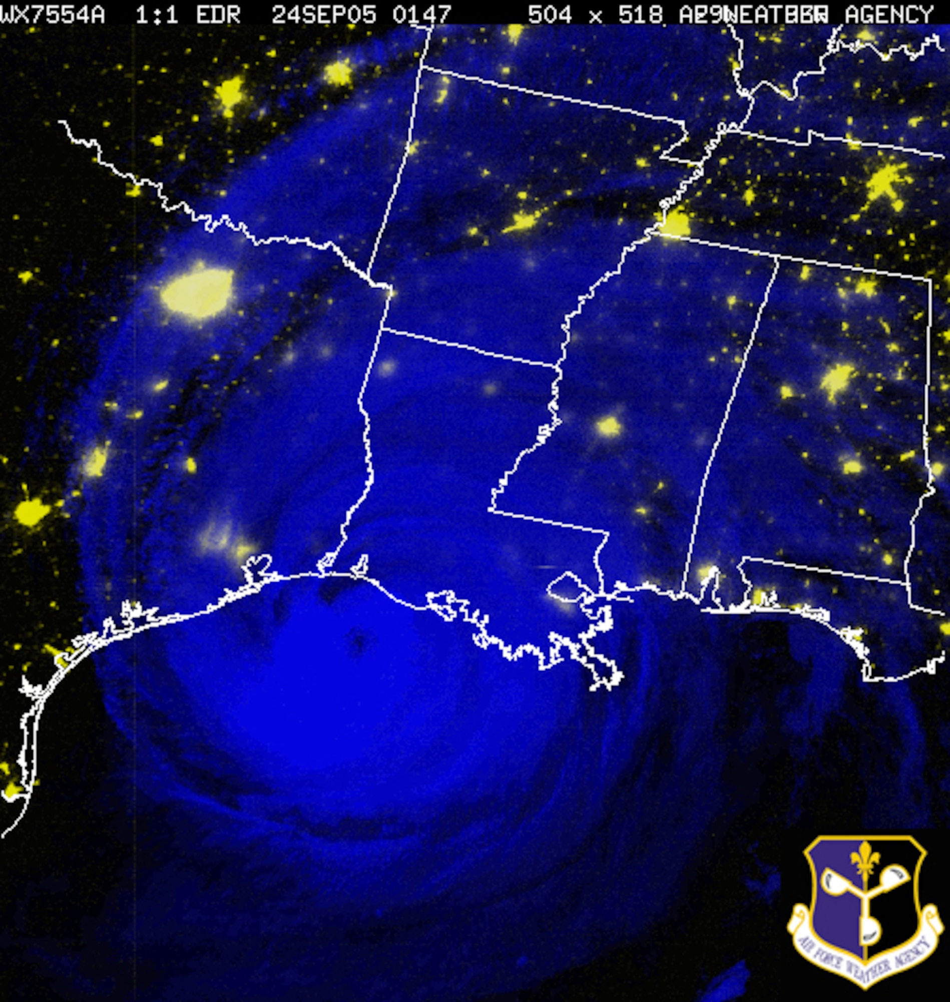 A Defense Meteorological Satellite Program nighttime image of Hurricane Rita just before landfall Sep. 23, 2005. The DMSP F-16 satellite image from 8:47 p.m. (CDT) Sep. 23, is a multispectral image that uses both infrared and visual satellite imagery to produce a color composite that reveals clouds and lights. The infrared portion is in blue, showing clouds, and the visible portion is in yellow, showing city lights. Image courtesy of the Air Force Weather Agency. 