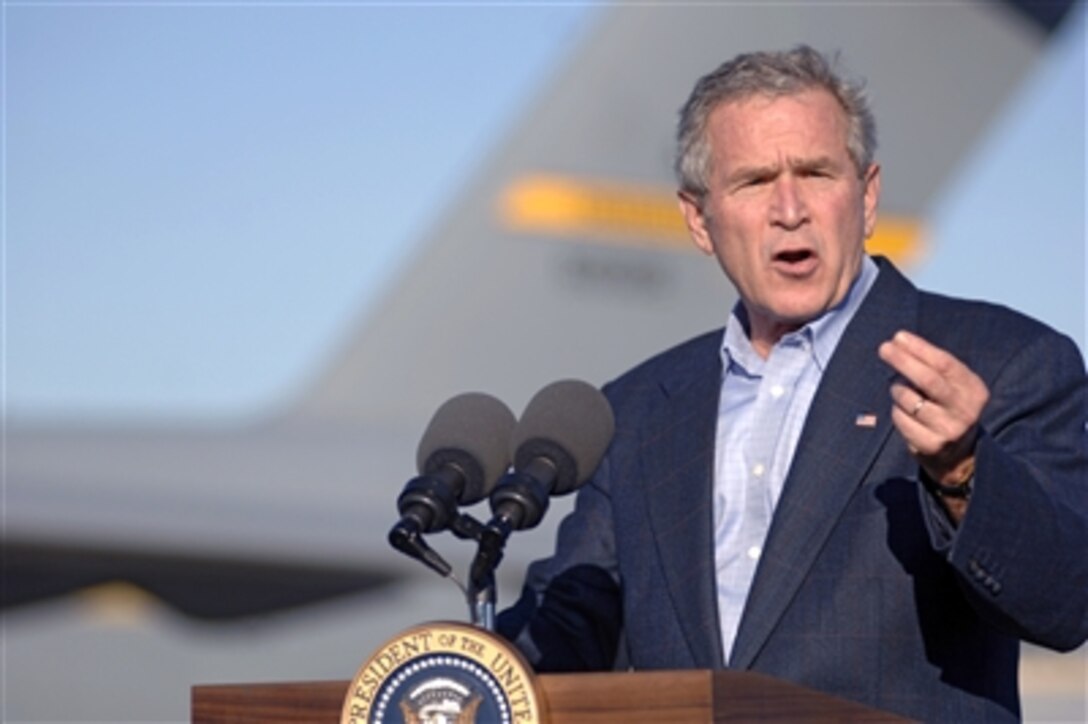 President George W. Bush gives a motivational speech to U.S. servicemembers at Charleston Air Force Base, S.C., Oct. 28, 2006. The president thanked the troops for their contributions to the war on terror. 