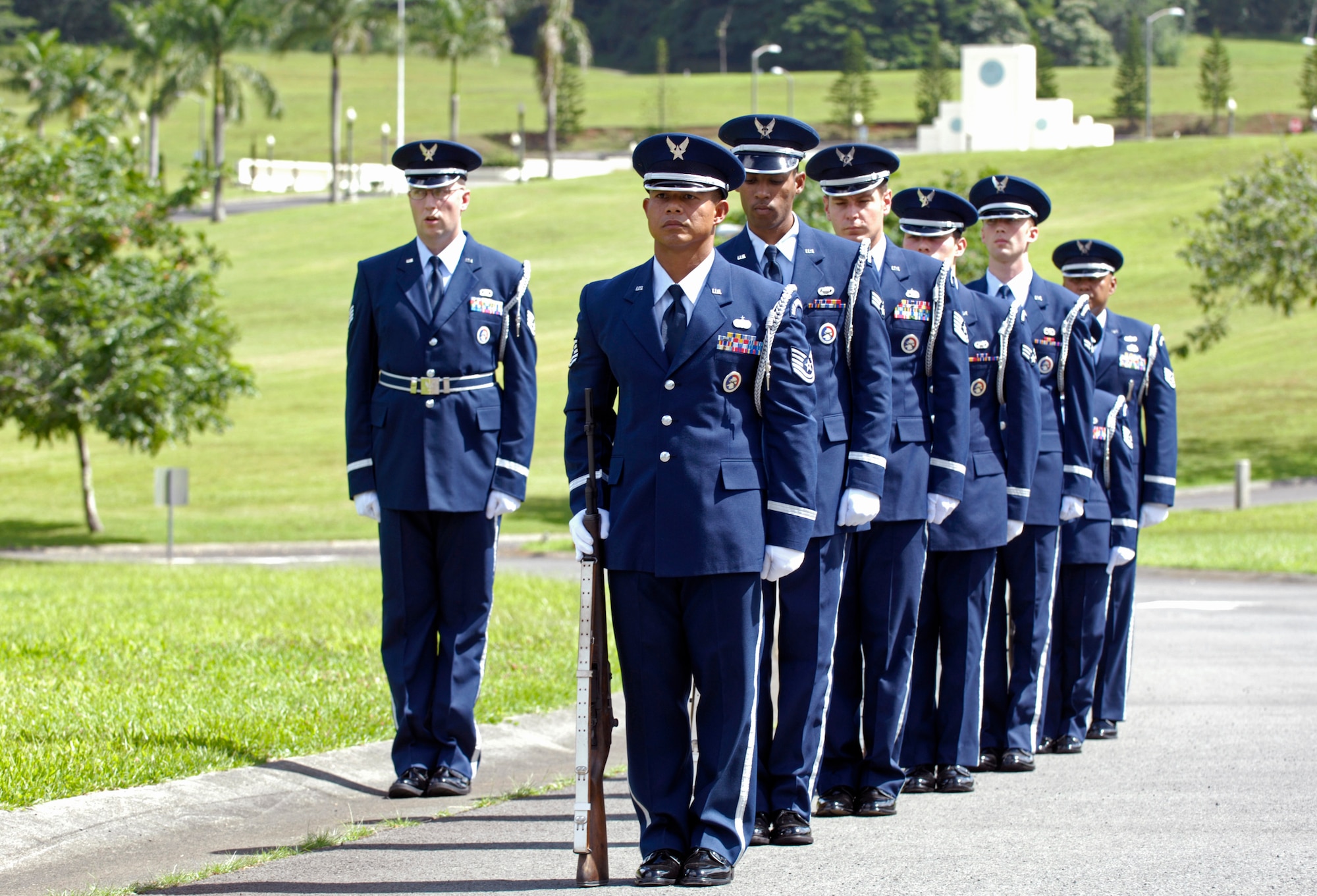 Members of the 15th Airlift Wing Honor Guard at Hickam Air Force Base, Hawaii, line up for a firing party Oct. 26 during a veteran's funeral at Hawaii Veterans Cemetery. The base honor guard is rendering military honors to the veteran and his family. (U.S. Air Force photo/ Tech. Sgt. Shane A. Cuomo)