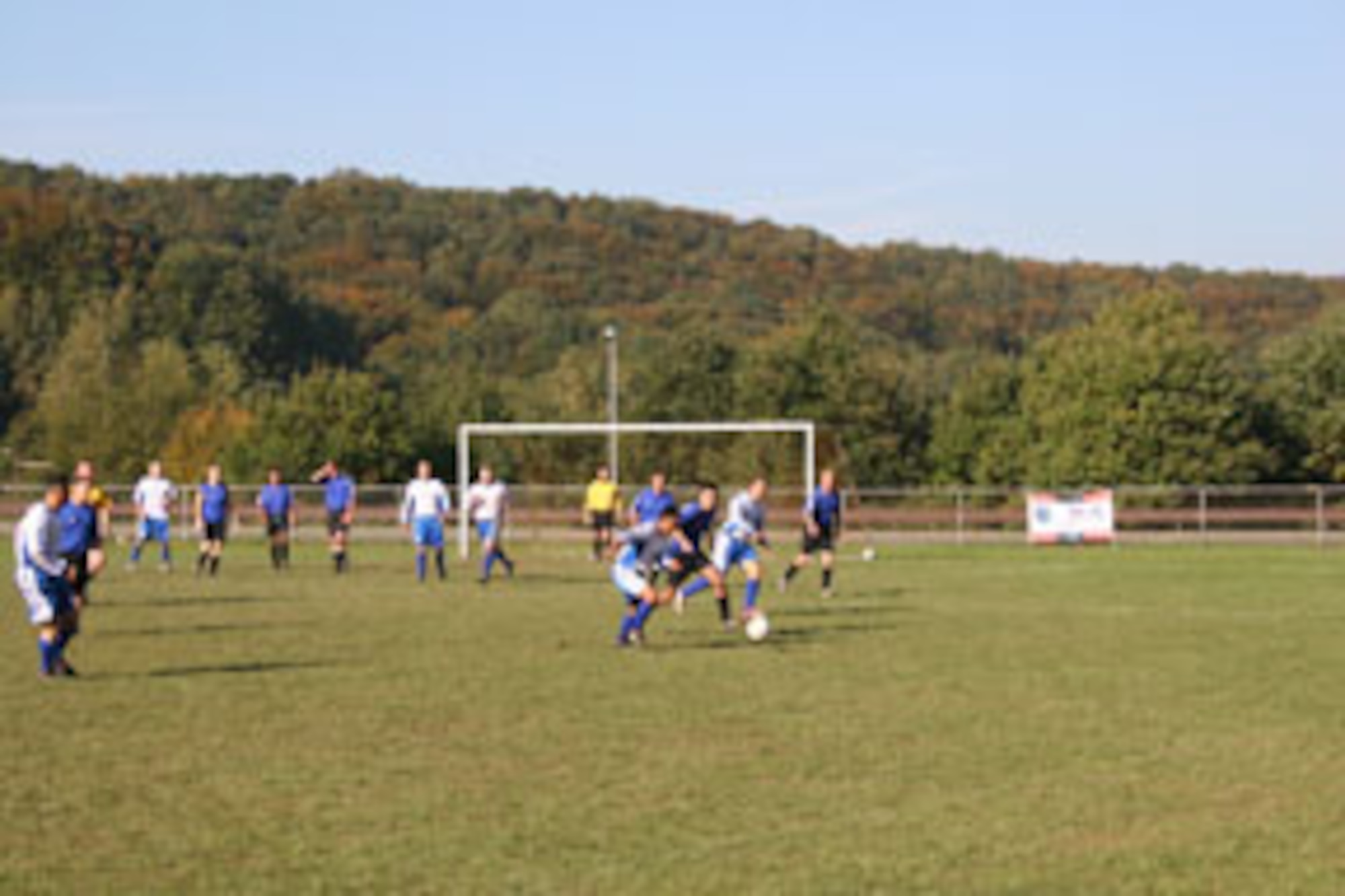 The Incirlik Men's Soccer Team attacks the goal after a corner kick against the 501st Combat Support Wing team from RAF Mildenhall, England, Oct. 18. The Incirlik Men's Soccer Team finished 1-3-1 in the U.S. Air Forces in Europe Soccer Tournament at Sembach Air Base, Germany, Oct. 16 to 20. (U.S. Air Force photo by Senior Airman Tim Beckham)