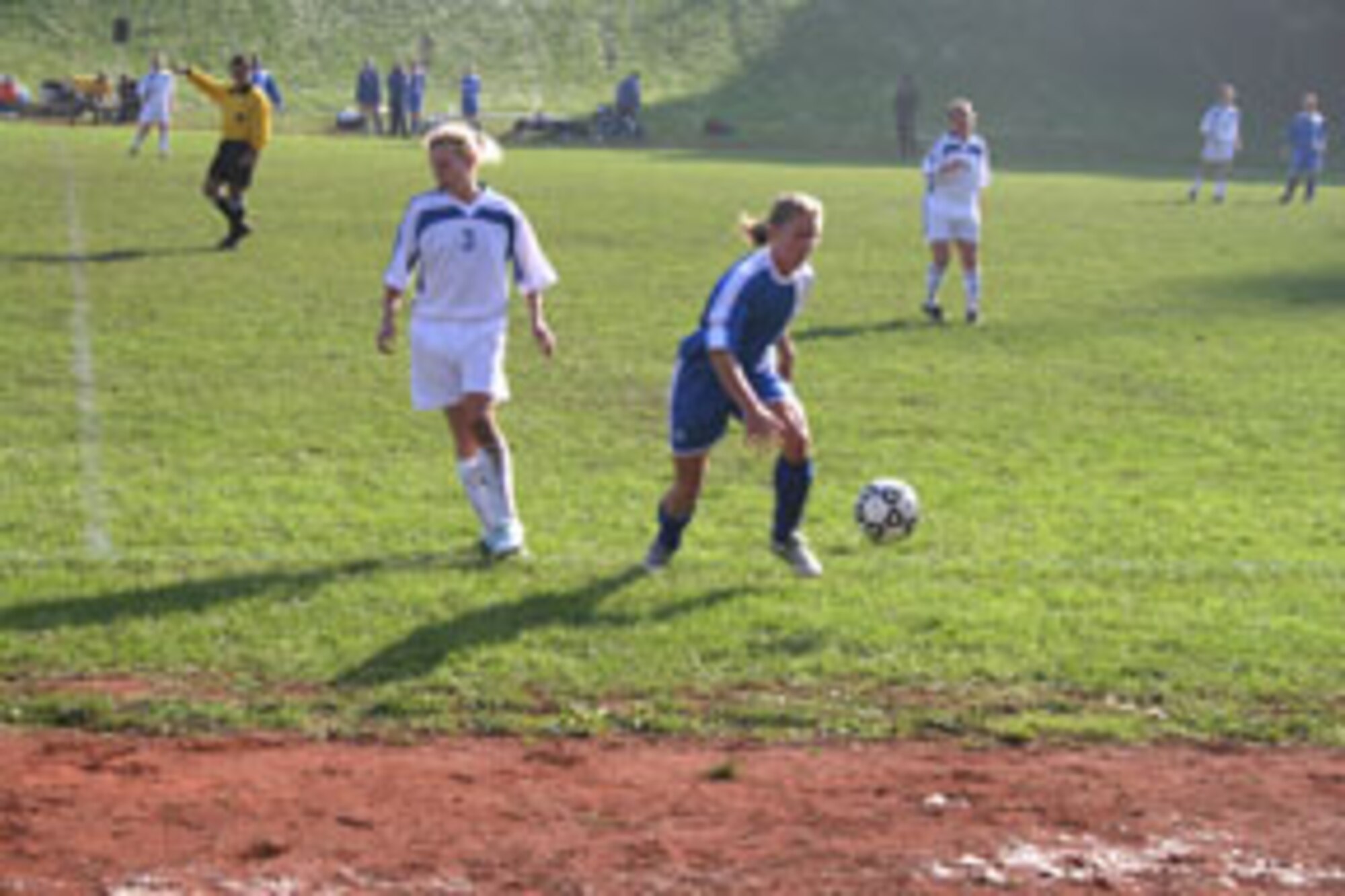 Jodi Whitener, Incirlik Women's Soccer Team midfielder, chases the ball out of bounds to throw it in against the Lakenheath women's team Oct. 18. The Incirlik Women's Soccer Team finished third at the U.S. Air Forces in Europe Soccer Tournament at Sembach Air Base, Germany, Oct. 16 to 20. (U.S. Air Force photo by Senior Airman Tim Beckham)