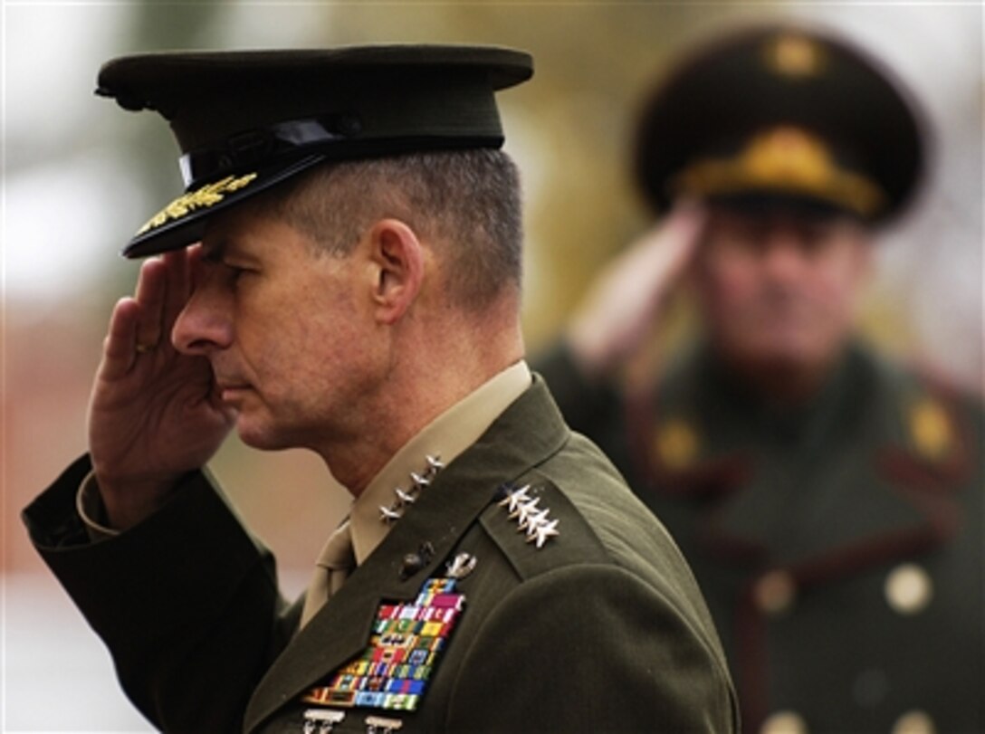Chairman of the Joint Chiefs of Staff Gen. Peter Pace, U.S. Marine Corps, salutes the Tomb of the Unknown Soldier during a wreath-laying ceremony in Moscow, Russia, on Oct. 30, 2006.  Pace is in Moscow to meet with his counterparts and enhance the military-to-military relationship between the United States and Russia.  