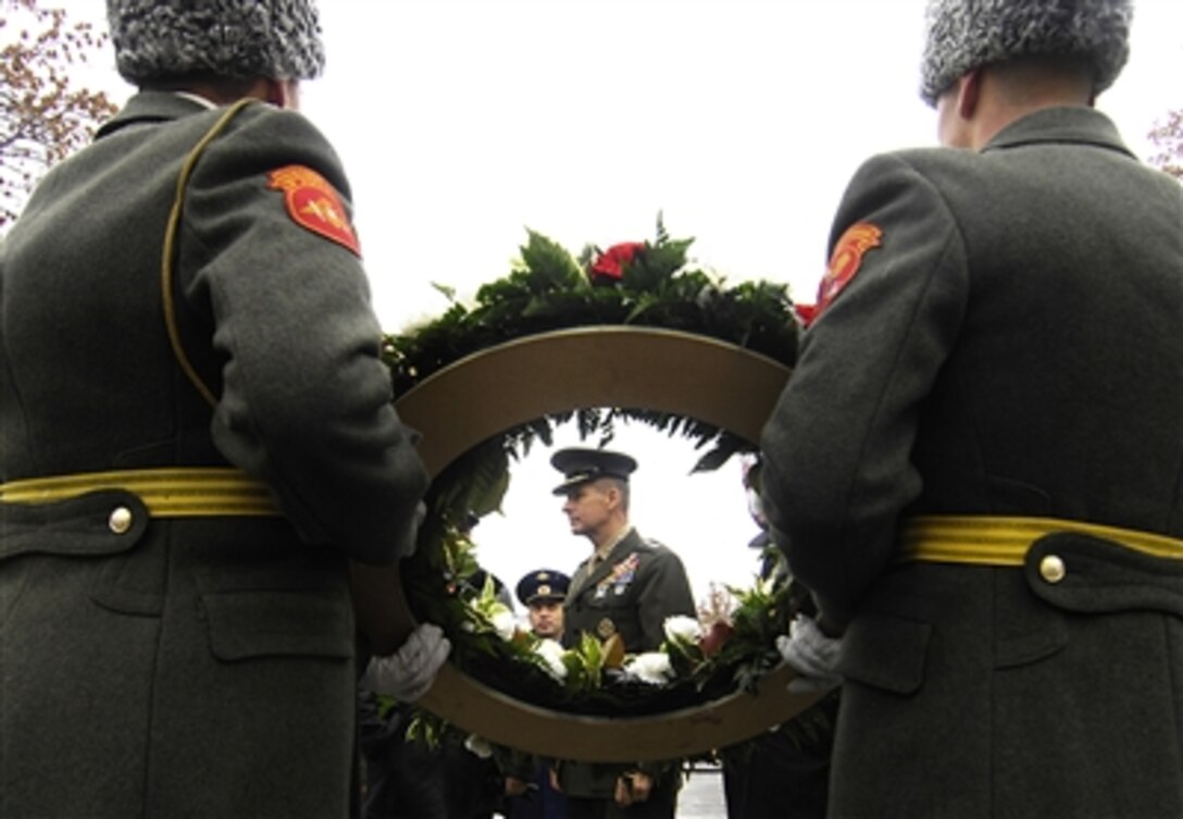 Chairman of the Joint Chiefs of Staff Marine Gen. Peter Pace goes through how the ceremony at the tomb of the unknown soldier will be conducted in Moscow, Oct. 30, 2006. 