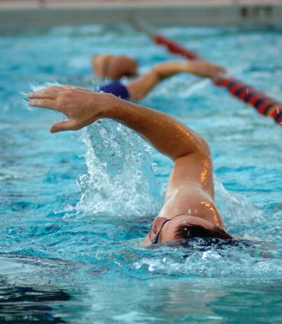 Racers start the triathlon by swimming 450 meters, 18 lengths, at the base pool. (U.S. Air Force photo by Airman 1st Class Nic Pilch) 