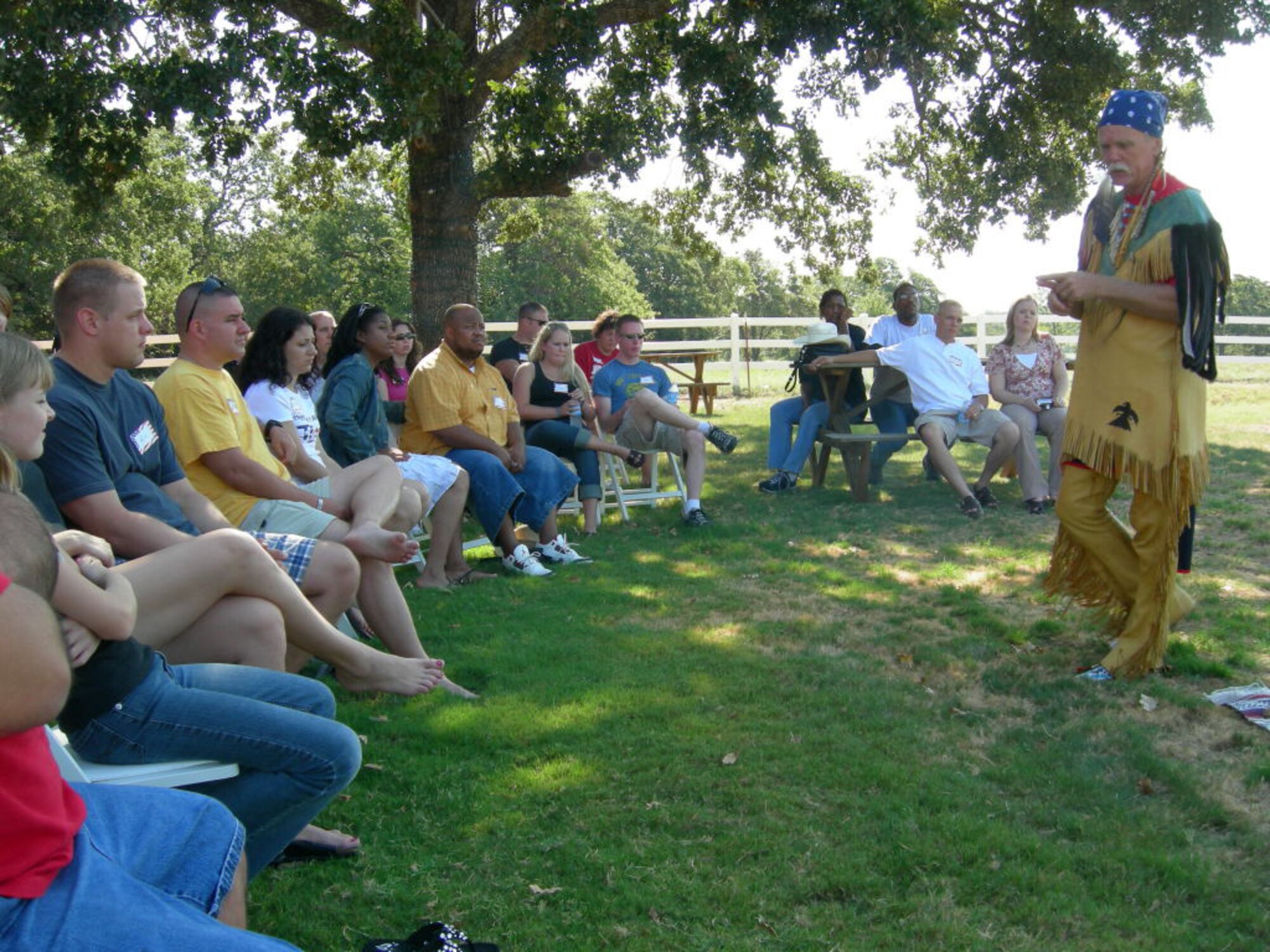 Military couples get advice from Yellowbow, a motivational speaker, on spiritual healing and prayer during a retreat at the Lantana Lodge in Pilot Point, Texas, Aug. 25. The Phoenix Project is a program to help combat veterans and their spouses reconnect after being separated during deployments. (Courtesy photo)