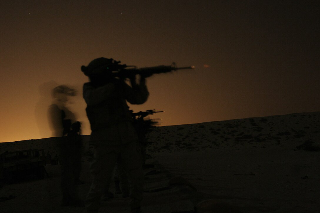 A Saudi Arabia Marine shoots an M-16A4 service rifle with night vision sights during a night live-fire shoot. Marines from Company B conducted Nautical Union, a bilateral training exercise with the Saudi Arabia Marines, June 2-8.