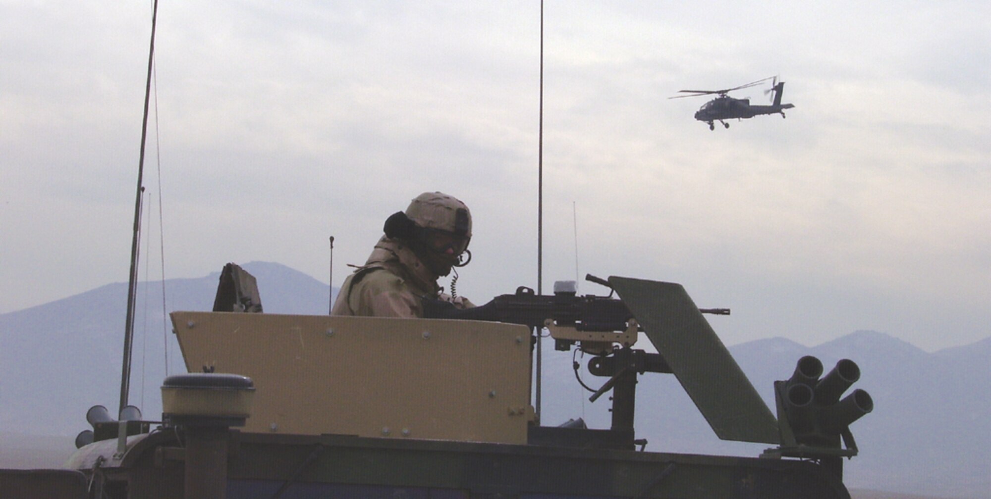 An Airman keeps watch over a forward deployed location in Afghanistan near the Bagram Theater Internment Facility, where 18 Airmen from the 30th Security Forces Squadron are deployed.(Courtesy photo)  


 
