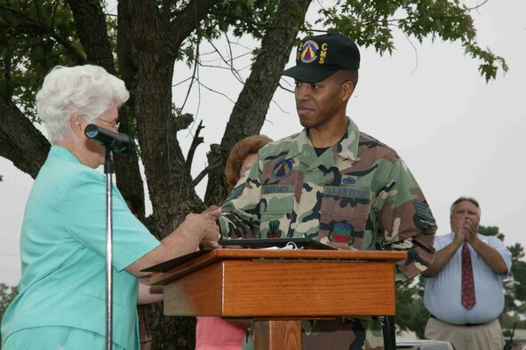 SHAW AIR FORCE BASE, S.C.-- Staff Sgt. Charles Heffner, 20th Component Maintenance Squadron, recently receives an award for his volunteer work with a local school.  (U.S. Air Force photo/Tarsha Storey)