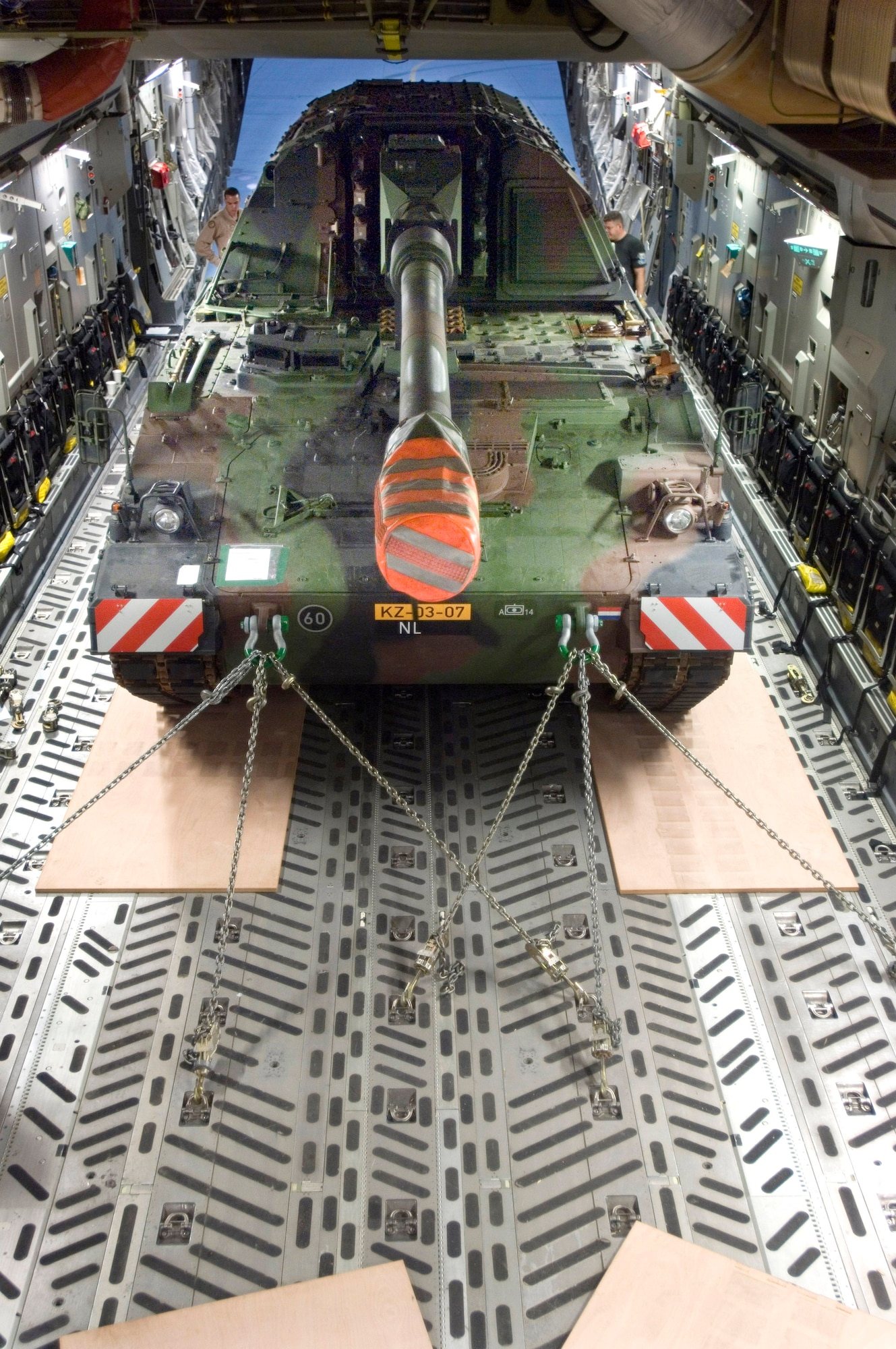 A Netherlander Howitzer 2000 is fastened to the floor of a C-17 Globemaster III at Ramstein Air Base, Germany, Sept. 6. The 60-ton tank will be flown to Afghanistan on board a C-17 from Charleston Air Force Base, S.C. (U.S. Air Force photo/Master Sgt. John Lasky) 


