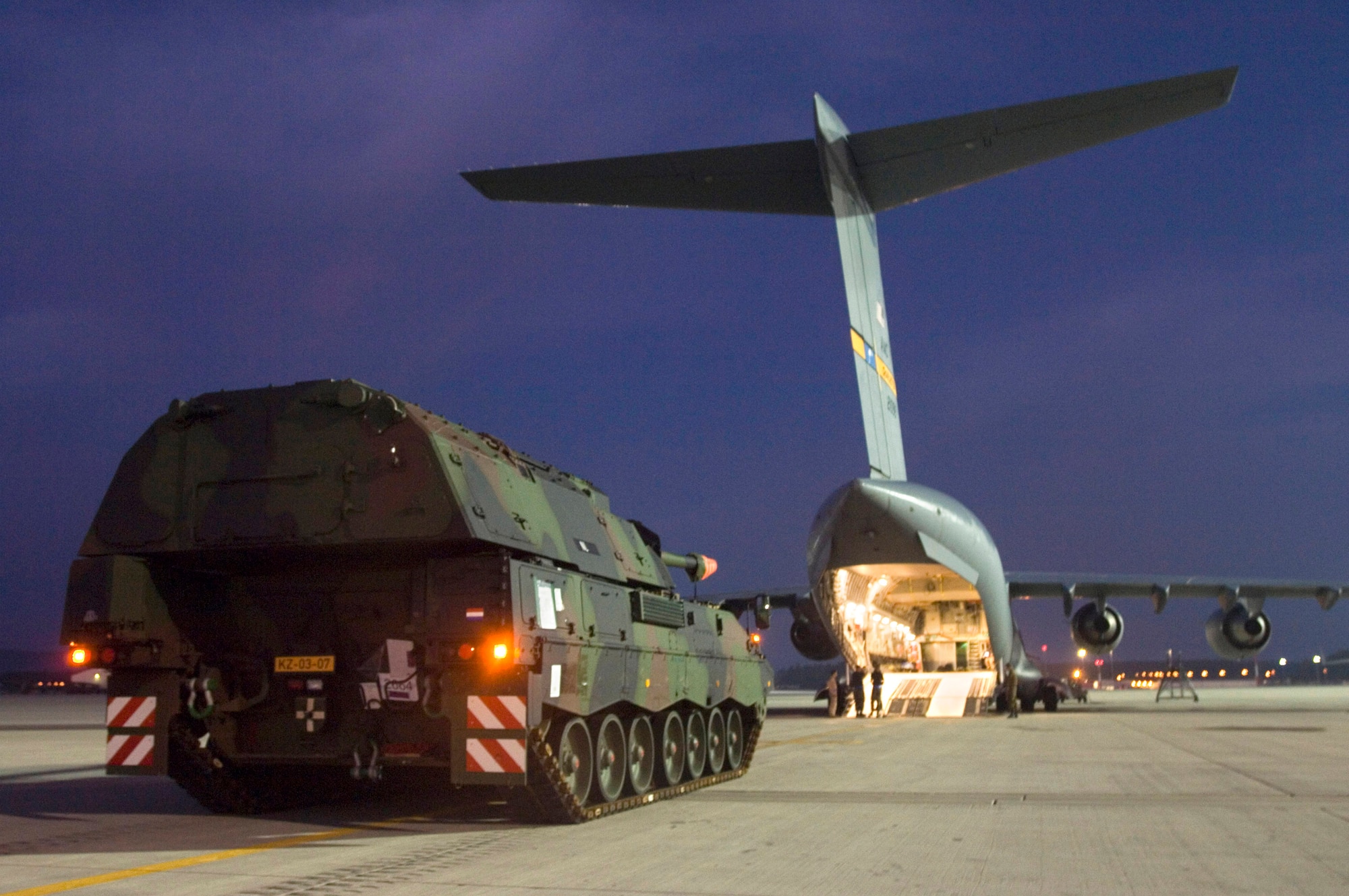 A Netherlander Howitzer 2000 waits to be loaded onto a C-17 Globemaster III at Ramstein Air Base, Germany, Sept. 6. The 60-ton tank will be flown to Afghanistan on board a C-17 from Charleston Air Force Base, S.C. (U.S. Air Force photo/Master Sgt. John Lasky)