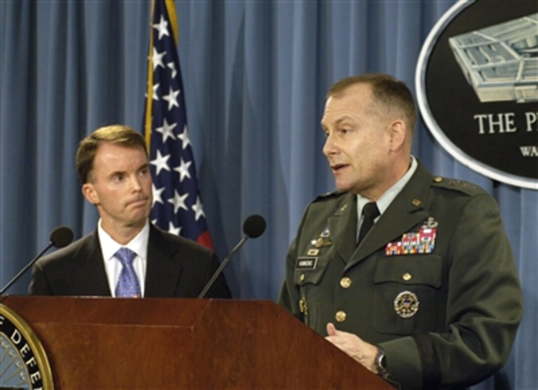 Assistant Secretary of Defense for Detainee Affairs Cully Stimson (left) and Deputy Chief of Staff for Intelligence Lt. Gen. John Kimmons (right), U.S. Army, brief reporters on the adoption of two new documents governing the handling of detainees in U.S. Department of Defense custody during a Pentagon press conference on Sept. 6, 2006.  Department of Defense Directive 2310.01E and Army Field Manual 2-22.3 will provide plainly worded doctrinal guidance across the full range of human intelligence collection operations.  