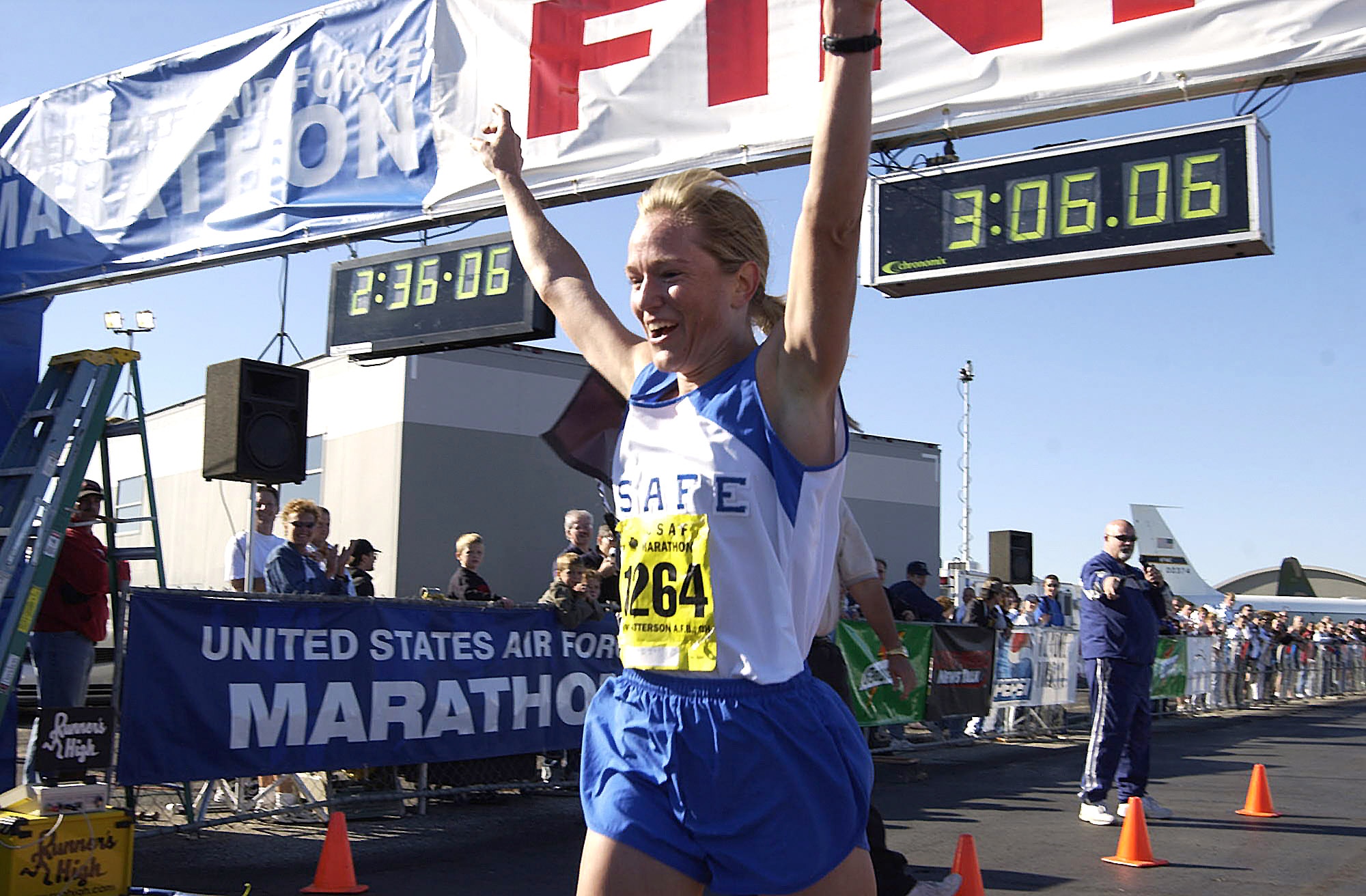 Maj. Jill Metzger, the personnel chief at the 376th Air Expeditionary Wing at Manas Air Base, Kyrgyzstan, is still missing after disappearing during a shopping trip at the nearby capital city of Bishkek.  Major Metzger, a champion marathon runner, is shown here crossing the line as the first female finisher of the 2004 Air Force Marathon.  (U.S. Air Force photo/Spencer Lane)