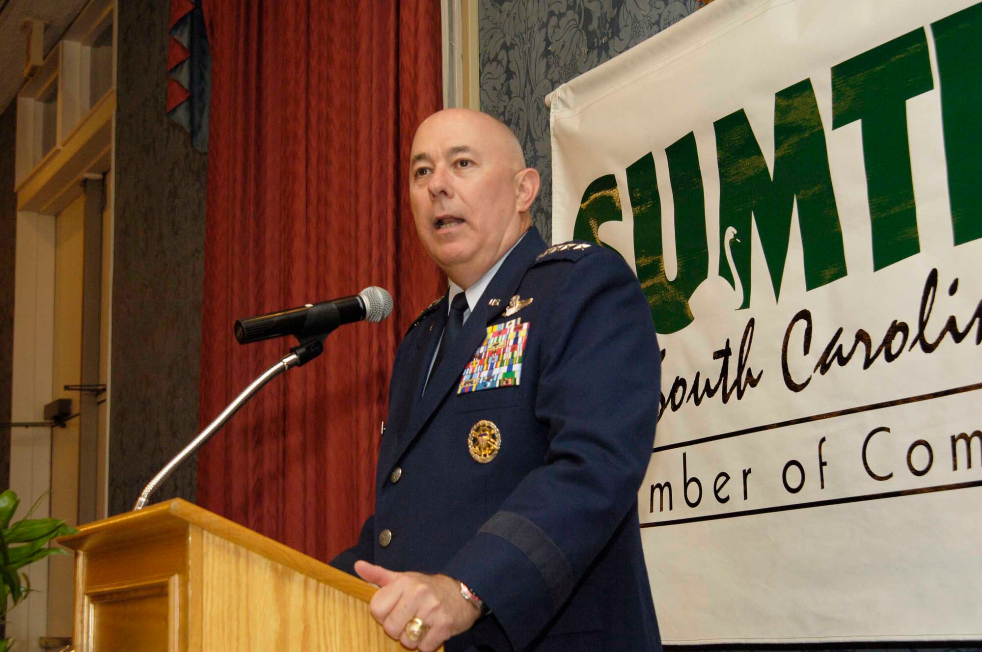 SHAW AIR FORCE BASE, S.C.-- General T. Michael Moseley, Air Force Chief of Staff, speaks to the Air Force Association and Sumter Chamber of Commerce annual dinner Aug. 31. He spoke about recapitalization of assets, the professionalism of Airmen and gave a bird's-eye-view of what the Air Force accomplished. He also paid tribute to the community, stating it plays a important role in taking care of families during deployments. (U.S. Air Force photo/Airman 1st Class William Coleman)
