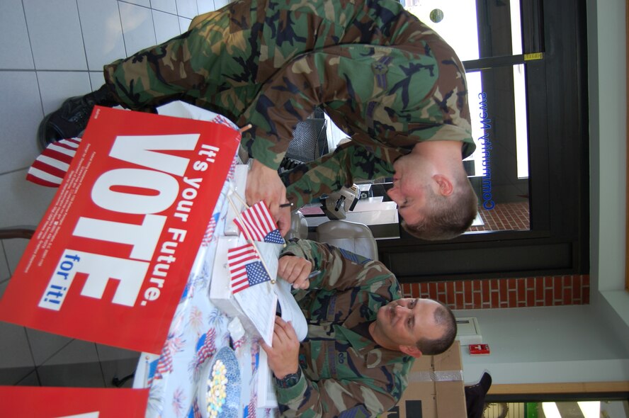 Voting representatives are at the Base Exchange with absentee ballot request forms. Squadron POC: