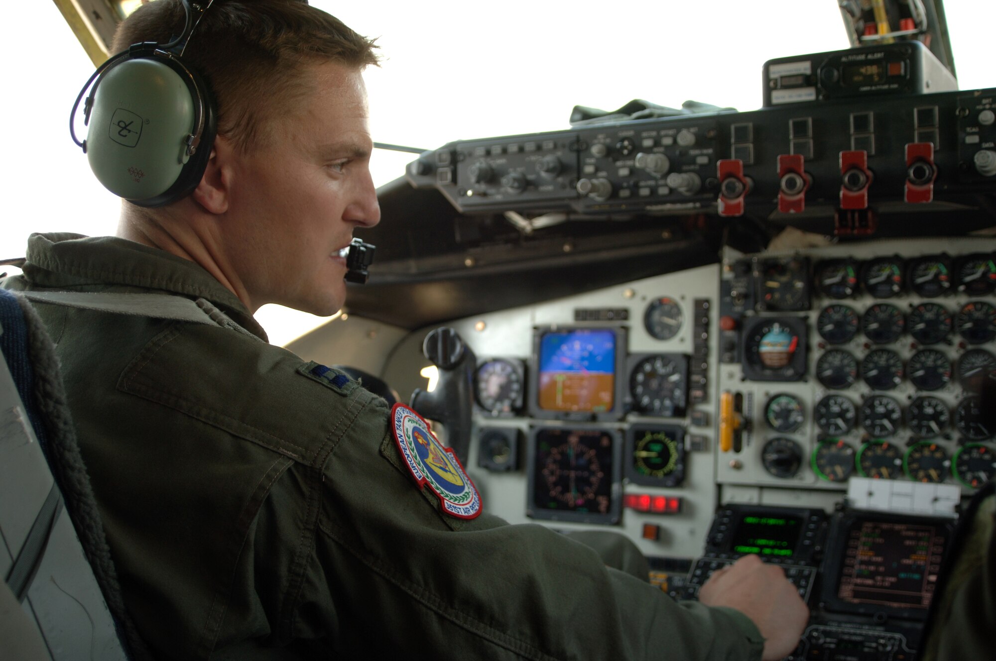 Capt. Jason Sovers checks the instruments during a preflight inspection Sept. 5. Captain Sovers is a pilot from RAF Mildenhall, England, currently attached to the 90th EARS. (U.S. Air Force photo by Airman 1st Class Nathan Lipscomb)