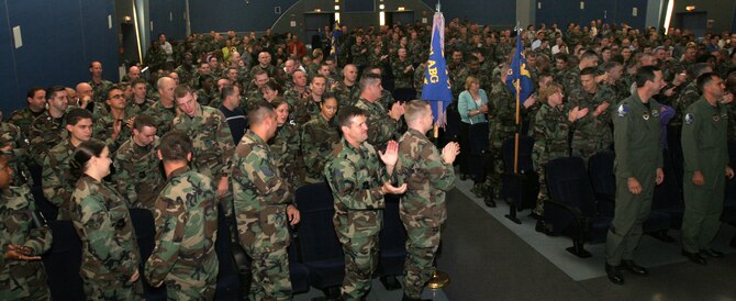 Members of the 38th Combat Support Wing celebrate after receiving an “Excellent” rating in the wing’s first-ever Unit Compliance Inspection. Photo by Master Sgt. Richard C. Puckett