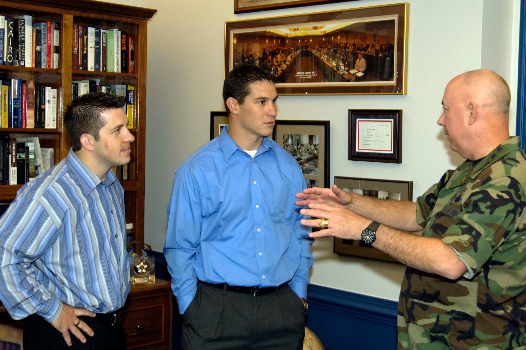 Air Force Chief of Staff Gen. T. Michael Moseley talks with Matt Zitzlsperger and Matt Rillos of Team Air Force from the "Treasure Hunters" reality television show during their visit to the Pentagon Sept. 7. (U.S. Air Force photo/Tech. Sgt. Cohen A. Young)