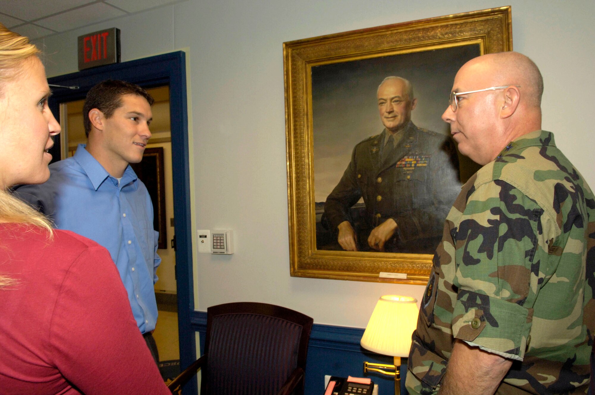 Air Force Chief of Staff Gen. T. Michael Moseley talks with Matt and Brooke Rillos of Team Air Force from the "Treasure Hunters" reality television show during their visit to the Pentagon Sept. 7. (U.S. Air Force photo/Tech. Sgt. Cohen A. Young)