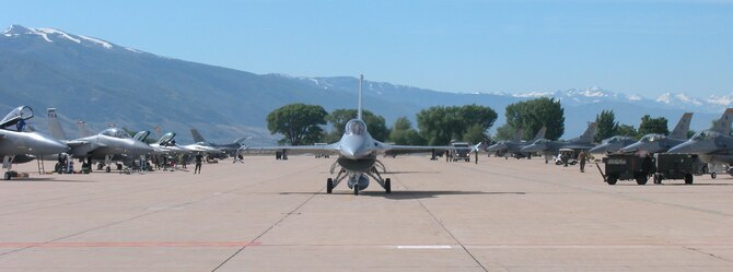 Reserve F-15 and F-16 aircraft are lined up on the 419th Fighter Wing ramp for a training exercise June 2-4. The exercise marked the last time many of the pilots would fly and train together due to upcoming changes as a part of the Air Force's Total Force Integration efforts and Base Realignment and Closure plans. (U.S. Air Force Photo/Senior Airman Nathan Greer)