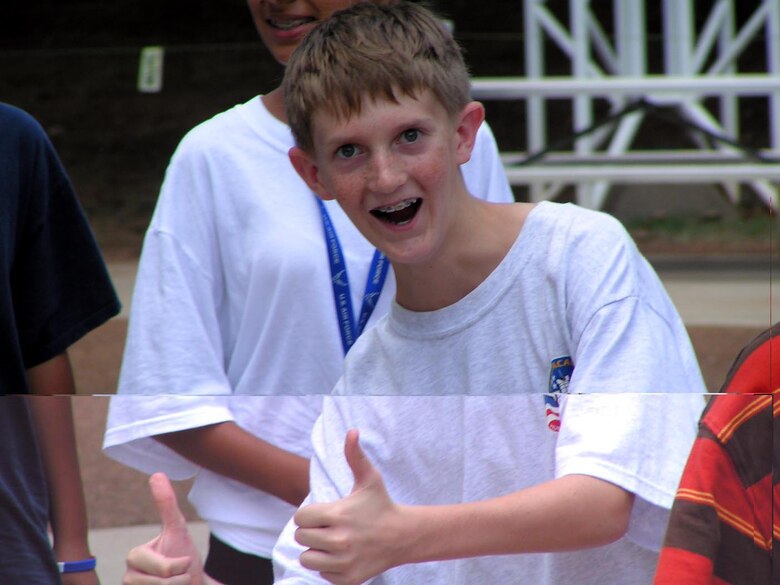 Regan Roshetko gives enthusiastic thumbs up at the Space Academy graduation ceremony after receiving the best mission award. (Courtesy Photograph)
