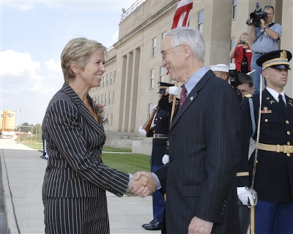 Deputy Secretary of Defense Gordon England (right) welcomes Norwegian Minister of Defense Anne-Grete Strom-Erichsen (left) on her first visit to the Pentagon on Sept. 7, 2006.  England and Strom-Erichsen will meet to discuss defense issues of mutual interest.  