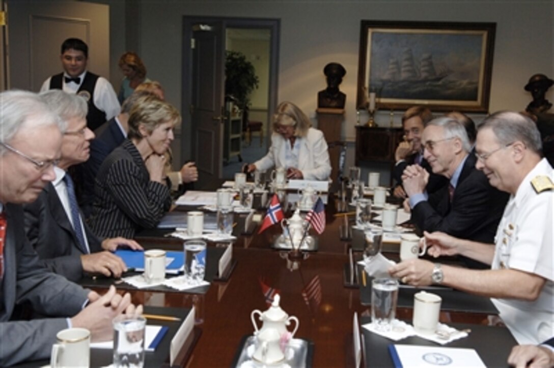 Deputy Secretary of Defense Gordon England (second from right) hosts a meeting with Norwegian Minister of Defense Anne-Grete Strom-Erichsen (third from left) in the Pentagon on Sept. 7, 2006.  England and Strom-Erichsen are meeting to discuss defense issues of mutual interest.  From left to right are National Armaments Director Leif Lindback, Norwegian Ambassador to the U.S. Knut Vollebaek, Strom-Erichsen, Counselor, Defense and Security Policy Kirsti Skjerven, U.S. Ambassador to Norway Benson Whitney, England, and Vice Chairman of the Joint Chiefs of Staff Adm. Edmund Giambastiani.  