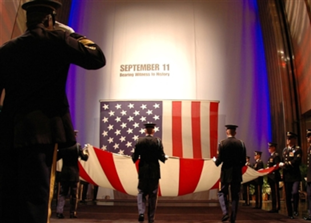 Old Glory is retired from the Smithsonian National Museum of American History by the Army Old Guard, Aug. 7, 2006. It will never be flown again. On Sept. 12, 2001, a day after the terrorist attacks, this flag was draped over the side of the Pentagon, where it remained for a month before it went to the museum.