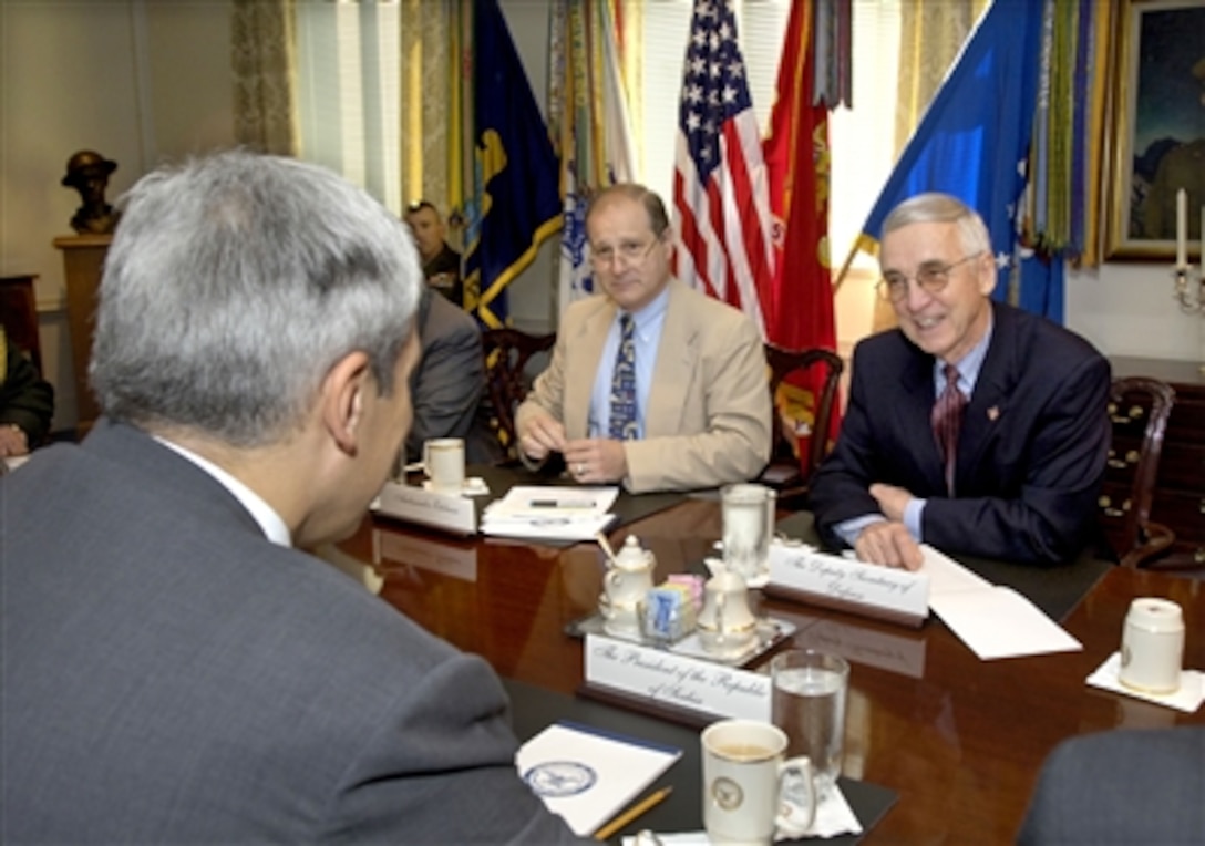 Deputy Secretary of Defense Gordon England (right) hosts a Pentagon meeting with Serbian President Boris Tadic (foreground) on Sept. 8, 2006, to discuss a broad range of bilateral security issues.  Among those participating in the talks is Under Secretary of Defense for Policy Eric Edelman (center).  
