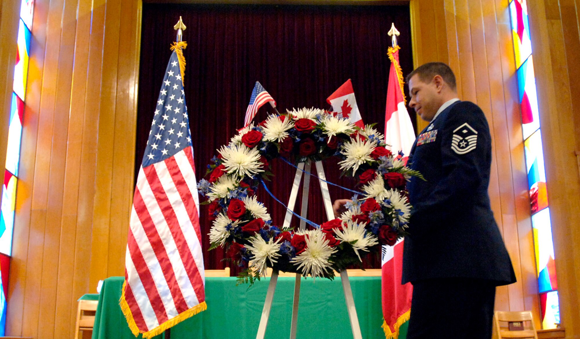 Master Sgt. Daniel Rebstock, first sergeant at 1st Air Force North at Tyndall Air Force Base, Fla., prepares a wreath for a special remembrance ceremony Sept. 11 to commemorate the victims and heroes of the 9/11 attacks. (U.S. Air Force photo/Tech. Sgt. Cecilio Ricardo Jr.)
