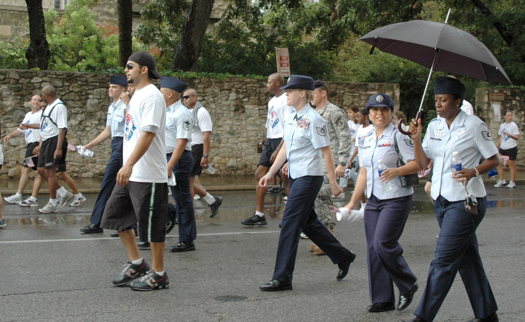 More than 1,200 servicemembers, civilians and children braved the rain in San Antonio to participate in the America Supports You Freedom Walk Sept. 11 to pay tribute to those who died on Sept. 11, 2001. (U.S. Air Force photo/Tech. Sgt. Phyllis Duff)