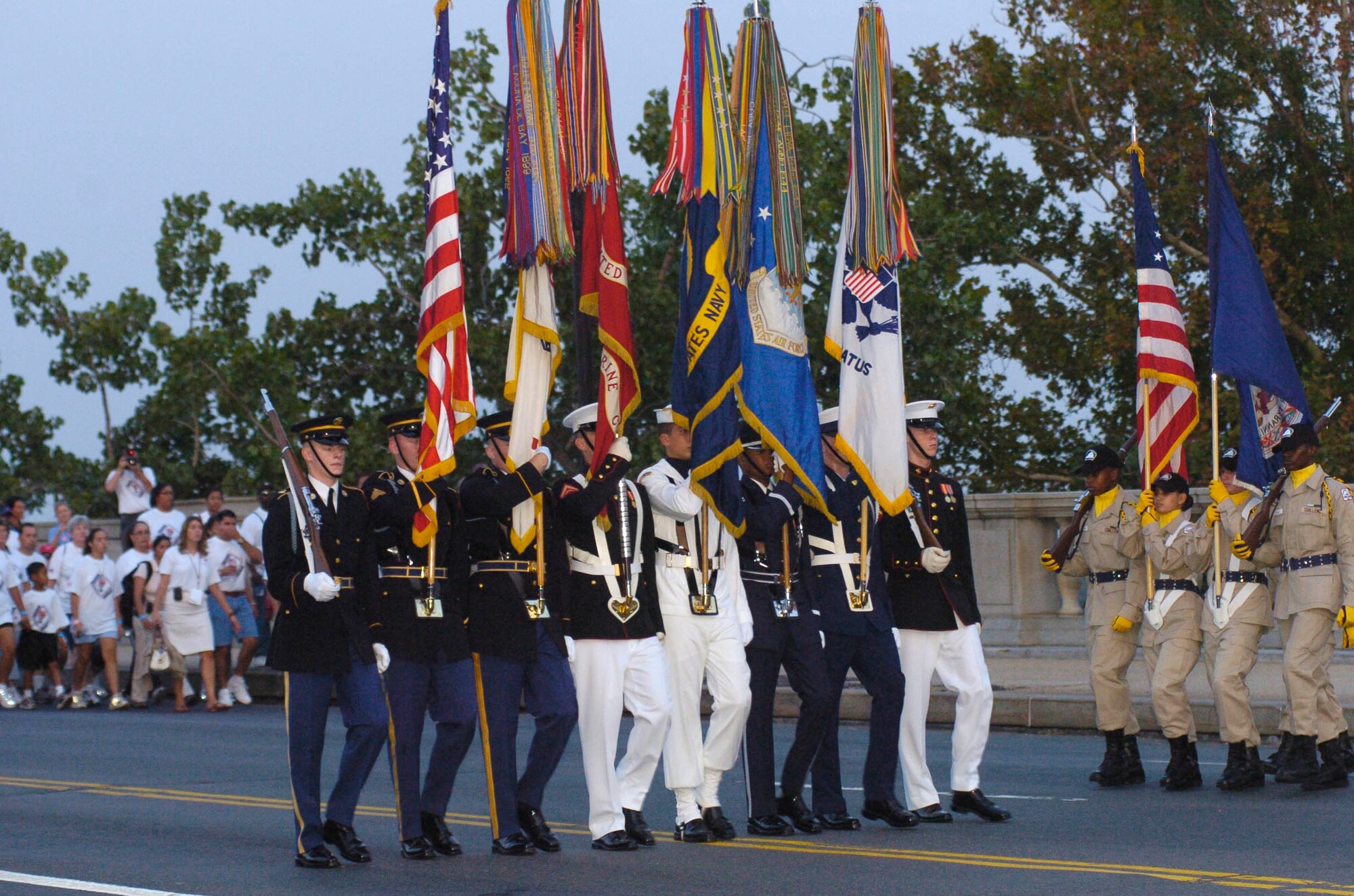 Members of the National Guard Youth Challenge Program (right) prepare to change places with the joint service honor guard on Memorial Bridge during the America Supports You Freedom Walk in Washington, D.C., Sept. 10.  (DOD photo/Army Spc. Thaddeus Harrington)