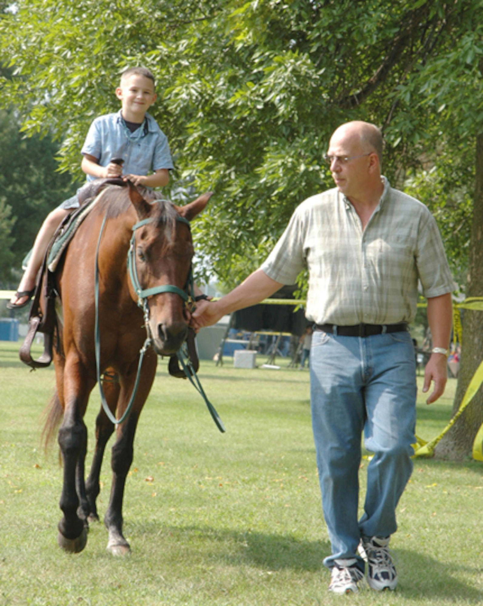 GRISSOM AIR RESERVE BASE, Ind -- Children had a chance to ride horses and ponies during this year's joint family day picnic. Families from Air Force Reserve, Army Reserve, Navy Reserve and Marine Corps Reserve units at Grissom, along with military retirees, came together for a fun and educational day.  (U.S. Air Force photo/SrA. Ben Mota)