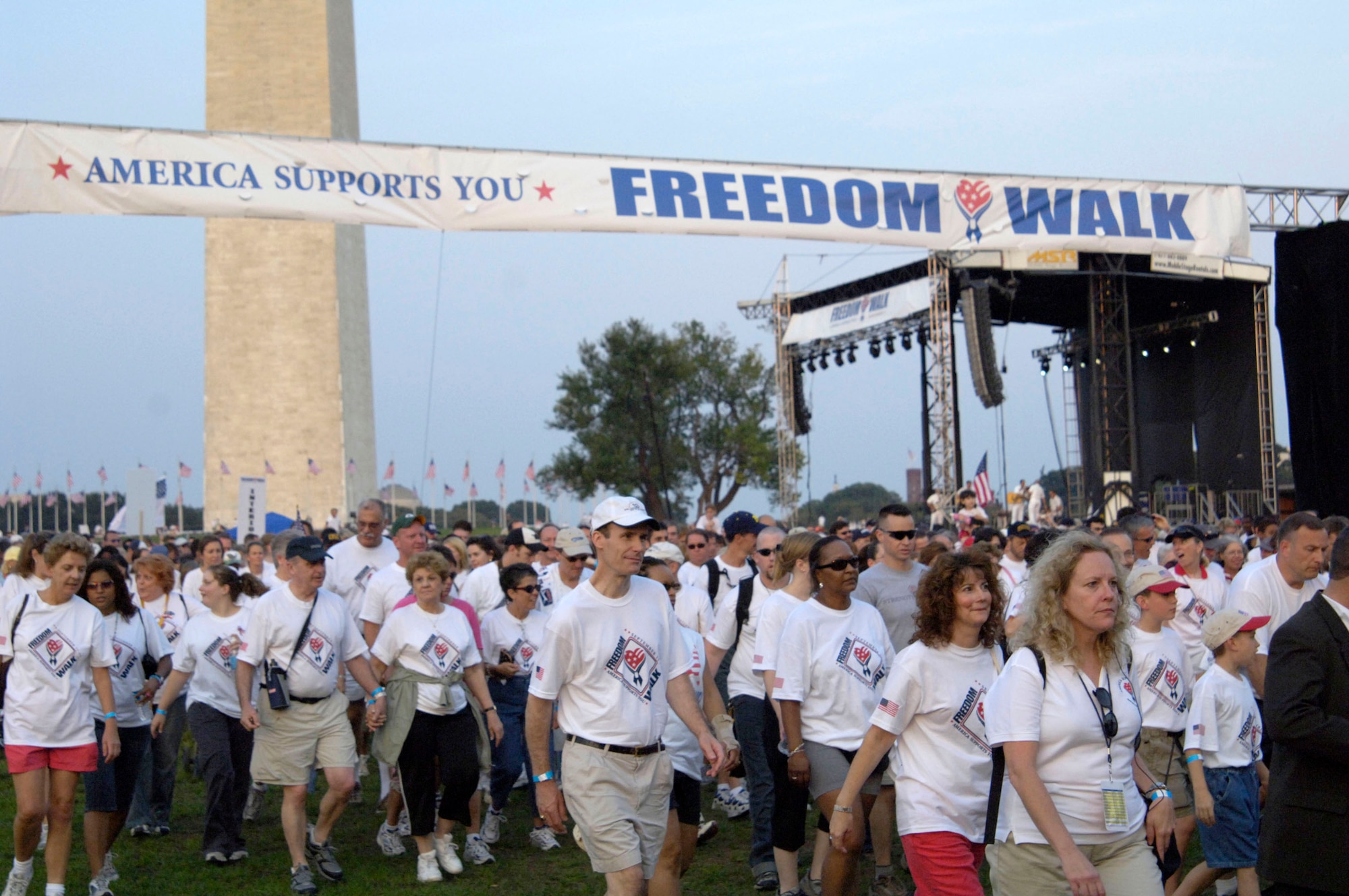 Thousands of participants start walking from the Washington Monument Sept. 10 to honor those who lost their lives Sept. 11, 2001, as a result of the terrorist attacks in New York, Washington and Pennsylvania. The walk concluded at the Pentagon where opera singer Denyse Graves performed. The Pentagon was then illuminated with 184 beams of light to commemorate the 184 lives who were lost at the Pentagon. (U.S. Air Force photo/Tech. Sgt. Cohen A. Young) 