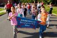 Students with the Columbia School, North Hanover, New Jersey carry a “America Supports You” banner during the Freedom Walk taking place in remembrance of September 11, 2001.  Third and fourth grade students from the Columbia and Discovery schools, North Hanover, New Jersey along with Airmen from McGuire Air Force Base and the local community participated in the walk on September 11, 2006. USAF photo by Denise Gould.