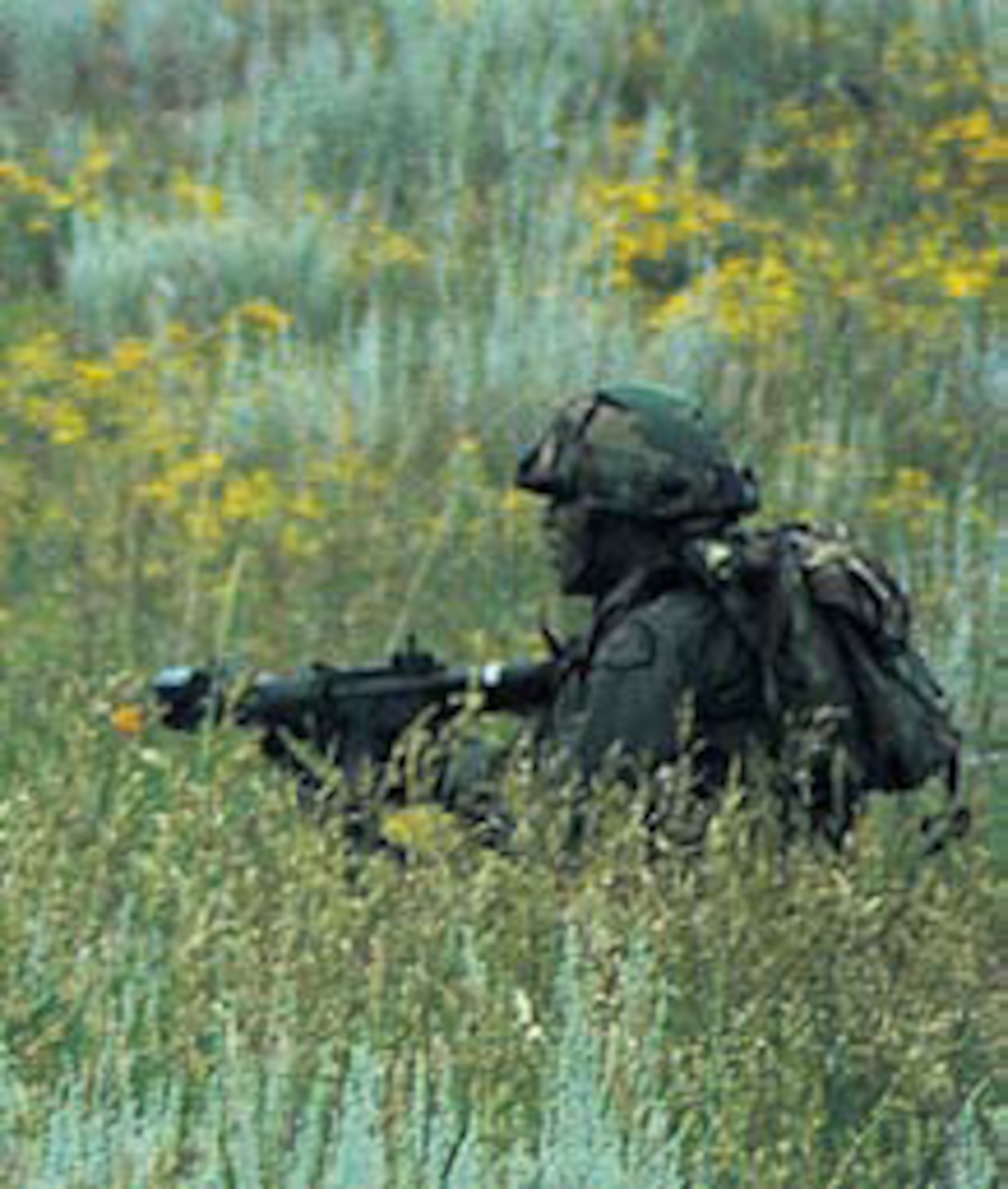 Darrell Worthen aims for his target as he reaches his destination. He was the lone survivor during the tactics portion of the competition.