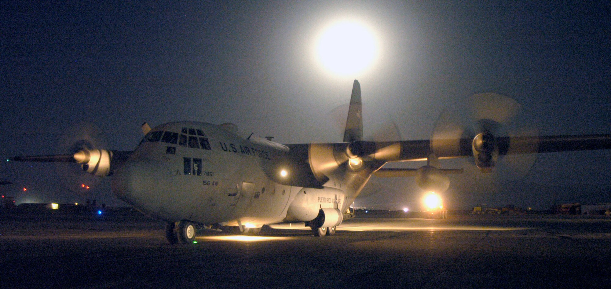 A C-130 Hercules from the 156th Airlift Wing, Puerto Rico Air National Guard, with 39 Guardsmen arrives at Bagram Airfield, Afghanistan, Sept. 8.  This is the first time the 156th has deployed to a combat zone.  They will support Operation Enduring Freedom with aircraft, aircrews and maintenance personnel for the next four months.  (U.S. Air Force photo/Maj David Kurle)