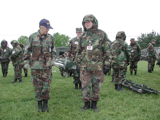 Members of the 932nd Airlift Wing at Scott AFB, Ill., are tested while taking care of a patient during an exercise.