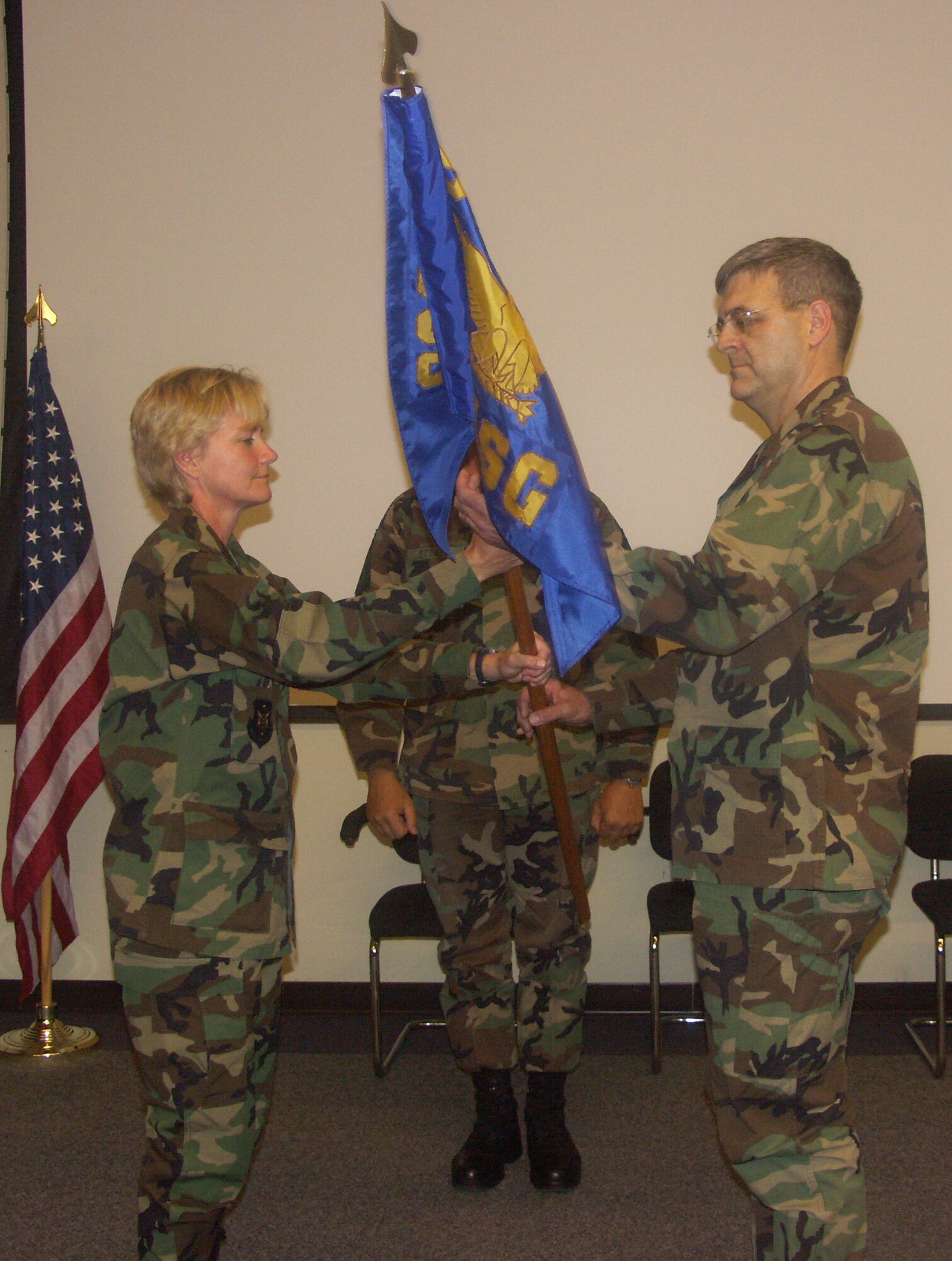 Col. Lynn Jobes (right) accepts command of the 932nd Mission Support Group from Col. Maryanne Miller, 932nd Airlift Wing commander. Photo by TSgt. Dan Oliver.