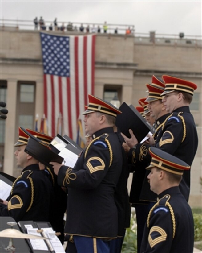 Members of the U.S. Army Chorus perform during the five-year observance of the Sept. 11, 2001, terrorist attack on the Pentagon on Sept. 11, 2006.  Vice President Dick Cheney, Secretary of Defense Donald H. Rumsfeld and Chairman of the Joint Chiefs of Staff Gen. Peter Pace, U.S. Marine Corps, addressed the family members of the victims.  