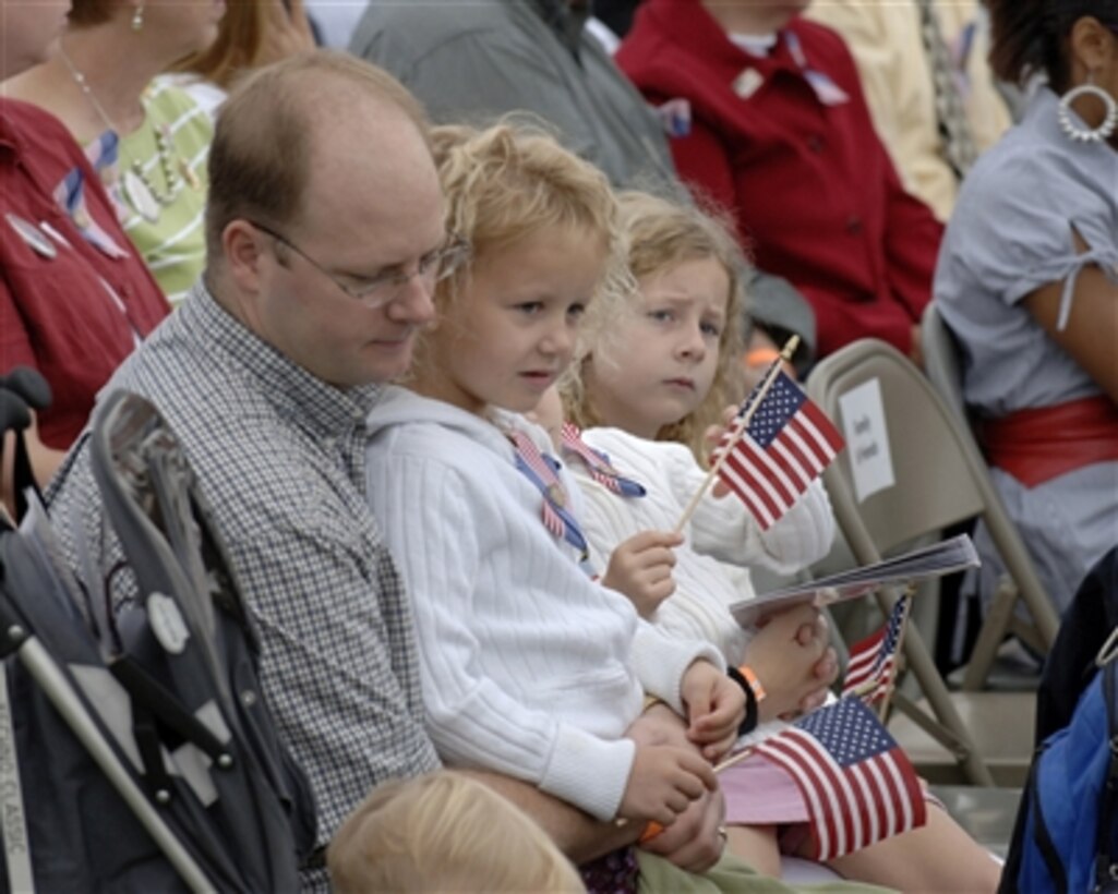 Family members of victims of the Sept. 11, 2001, terrorist attack on the Pentagon attend the five-year observance held at the Pentagon on Sept. 11, 2006.  Addressing the families were Vice President Dick Cheney, Secretary of Defense Donald H. Rumsfeld and Chairman of the Joint Chiefs of Staff Gen. Peter Pace, U.S. Marine Corps.  