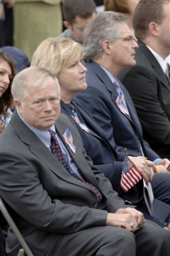 Family members of victims of the Sept. 11, 2001, terrorist attack on the Pentagon attend the five-year observance held at the Pentagon on Sept. 11, 2006.  Addressing the families were Vice President Dick Cheney, Secretary of Defense Donald H. Rumsfeld and Chairman of the Joint Chiefs of Staff Gen. Peter Pace, U.S. Marine Corps.  