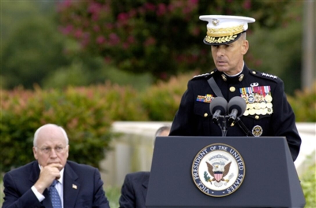 Chairman of the Joint Chiefs of Staff Gen. Peter Pace, U.S. Marine Corps, delivers remarks during Pentagon observances on Sept. 11, 2006, marking the 5th anniversary of the terrorist attack on the building.  Vice President Dick Cheney (left) and Secretary of Defense Donald H. Rumsfeld (behind Pace) also delivered remarks to the audience of relatives of the 184 Pentagon and American Airlines Flt. 77 victims as well as Pentagon employees.  
