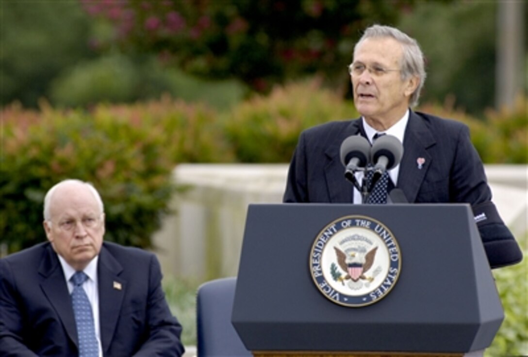 Secretary of Defense Donald H. Rumsfeld delivers remarks during a Sept. 11, 2006, Pentagon ceremony marking the 5th anniversary of the terrorist attack on the building.  Vice President Dick Cheney (left) and Chairman of the Joint Chiefs of Staff Marine Corps Gen. Peter Pace also addressed the audience of family members of the 184 persons killed in the attack and Pentagon employees.  