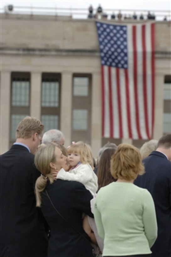 Family members of victims of the Sept. 11, 2001, terrorist attack on the Pentagon attend the five-year observance that included speeches by Vice President Dick Cheney, Secretary of Defense Donald H. Rumsfeld and Chairman of the Joint Chiefs of Staff Gen. Peter Pace, U.S. Marine Corps, on Sept. 11, 2006.  